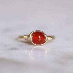 photo of a carnelian gemstone solitaire ring made with 14k gold-filled