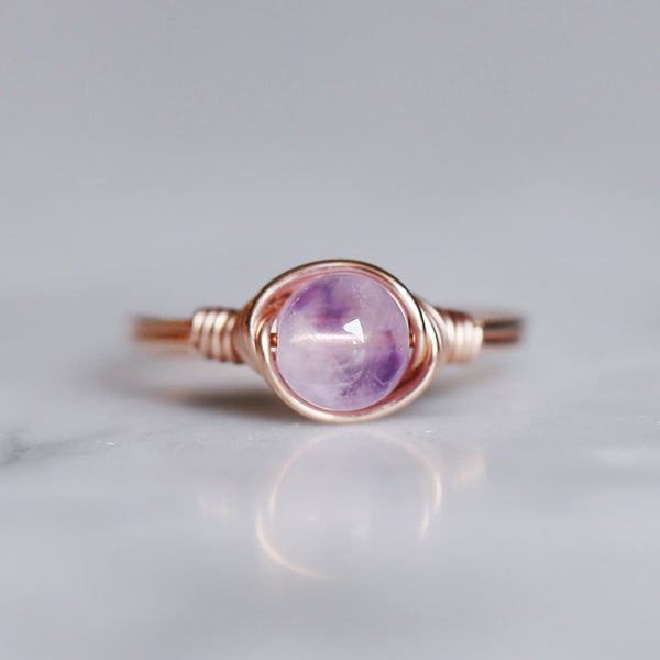 a lavender amethyst gemstone solitaire ring made with 14k rose gold-filled