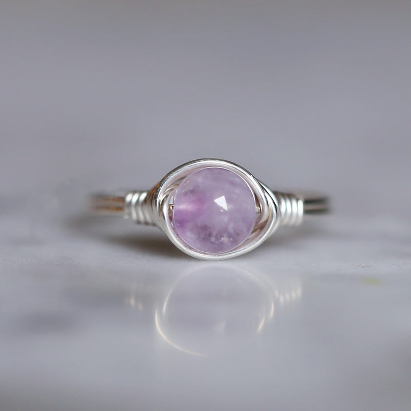 a lavender amethyst gemstone solitaire ring made with sterling silver