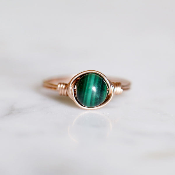 photo of malachite gemstone solitaire ring made of 14k rose gold filled