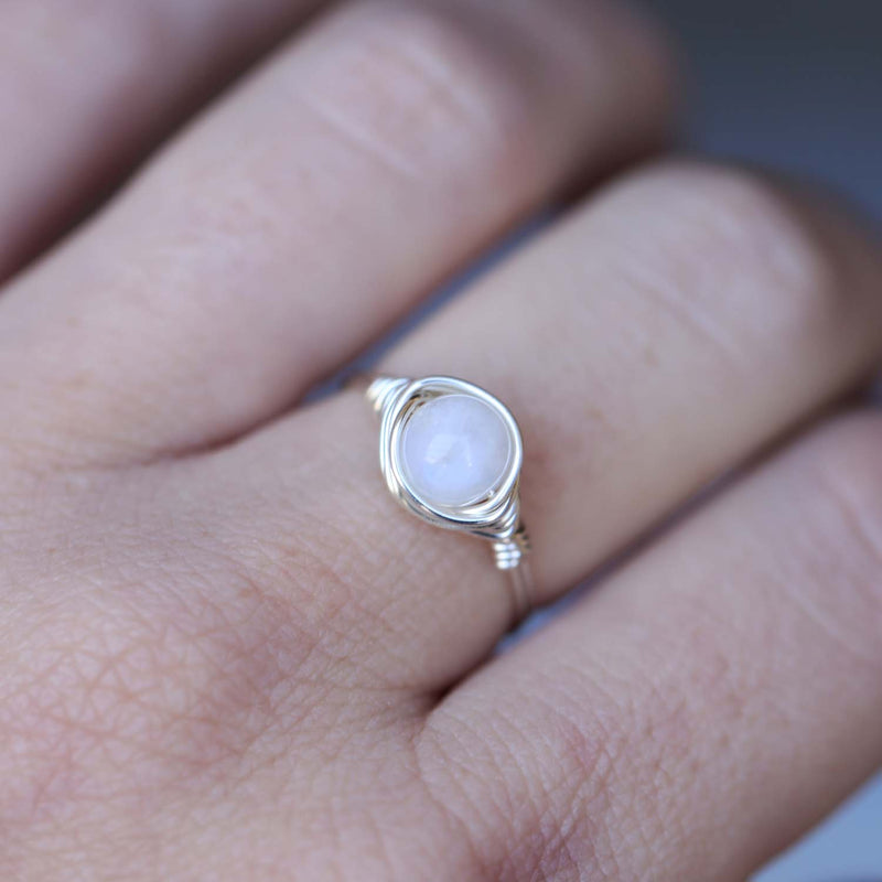 a moonstone gemstone solitaire ring featured on hand