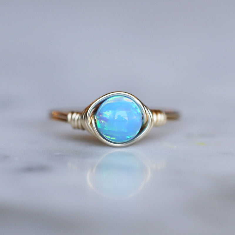 opal gemstone solitaire ring made with blue opal and 14k gold filled