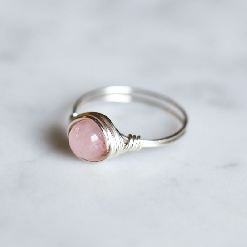 side view of rose quartz ring made with sterling silver