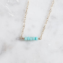 Close up of Salt City Gems Gold Necklace with Amazonite gemstones. Dainty Gold Necklace made with 14k Gold Fill or Sterling Silver, Both non tarnhish necklace options. Hand crafted gemstone necklace you don't have to take off. 