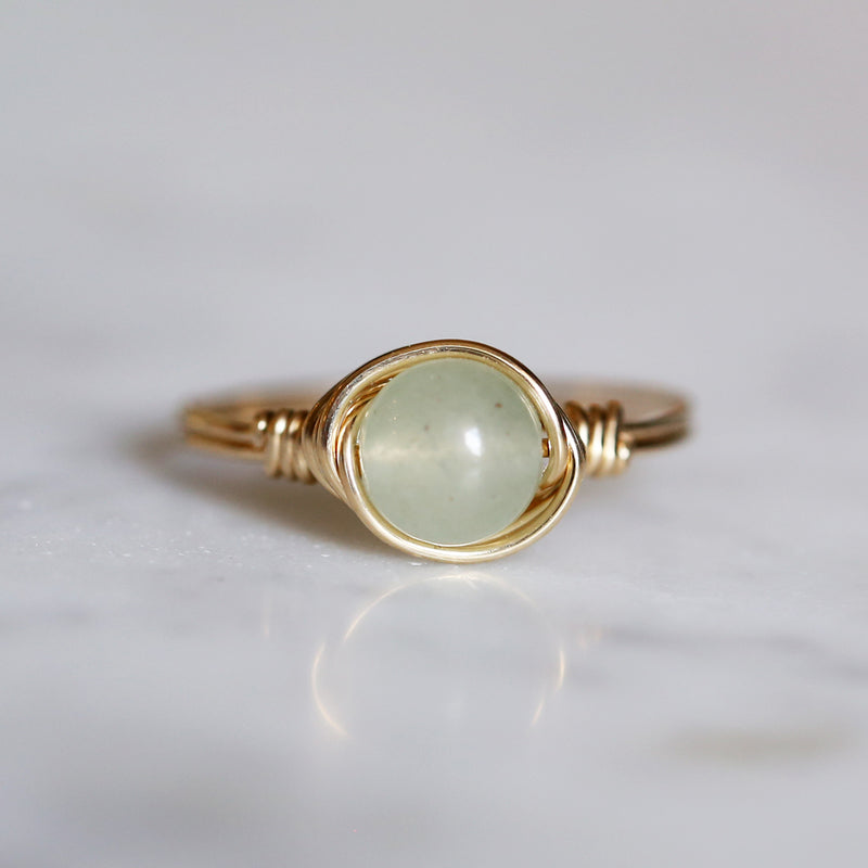 aventurine gemstone ring up close featuring band and setting made of 14k fold filled