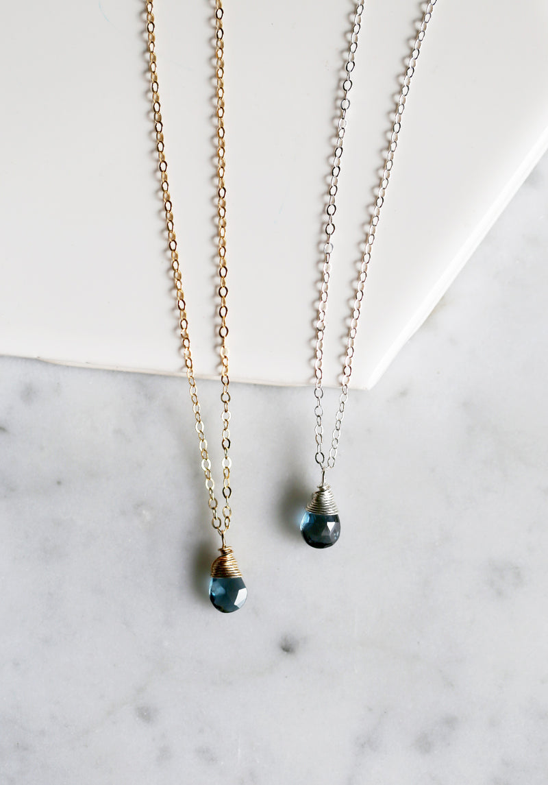 photo of two london blue topaz necklaces in 14k gold filled and sterling silver