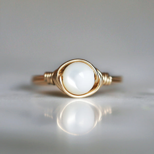 mother of pearl gemstone ring setting and band made of 14k gold filled