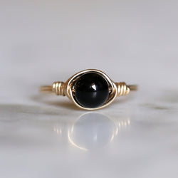 onyx gemstone ring with band and setting made of 14k gold filled wire