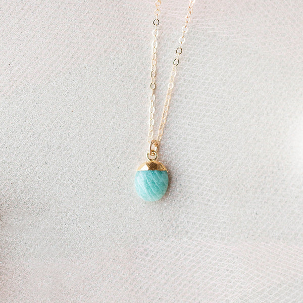 a pendant necklace made with an amazonite gemstone pendant with 14k gold filled chain